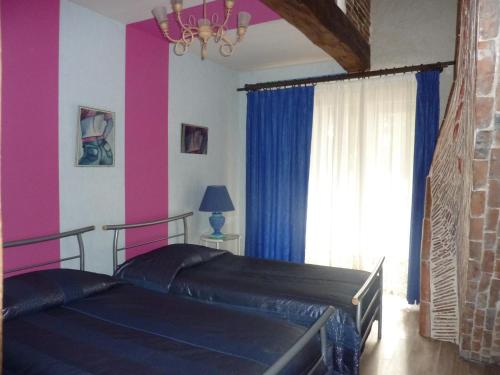 Imagen de la habitación del Hotel Le Village Gaulois. Foto 9