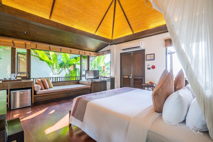 Imagen de la habitación del Hotel Le Vimarn Cottages and Spa. Foto 4