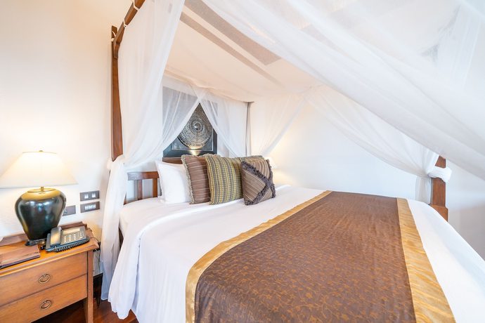 Imagen de la habitación del Hotel Le Vimarn Cottages and Spa. Foto 7