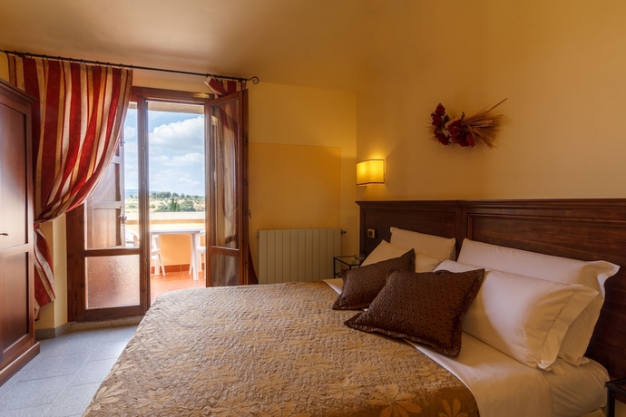 Imagen de la habitación del Hotel Le Volpaie. Foto 16