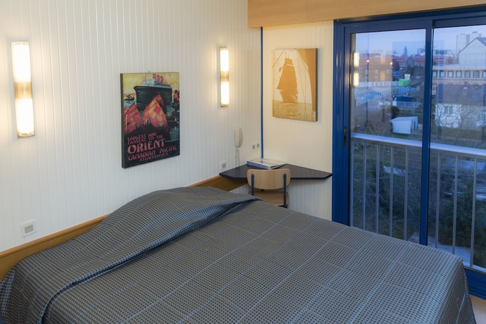 Imagen de la habitación del Hotel Le Voltaire. Foto 8