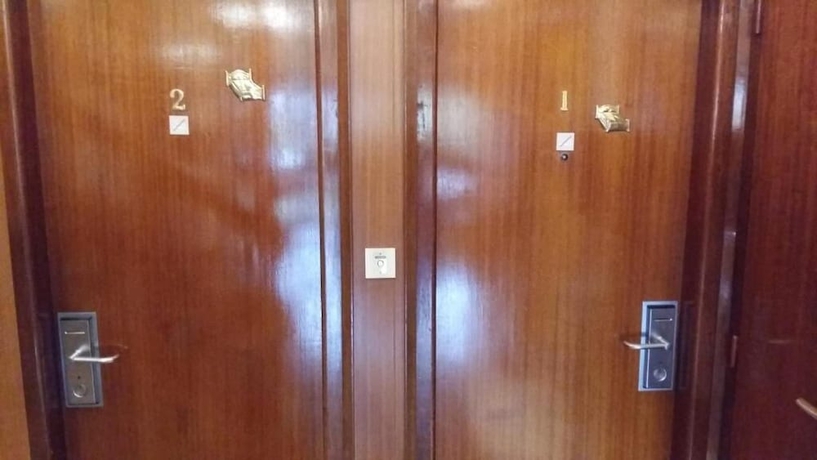 Imagen de la habitación del Hotel Le Voltaire. Foto 13