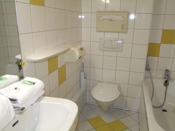 Imagen de la habitación del Hotel Le Voltaire. Foto 16