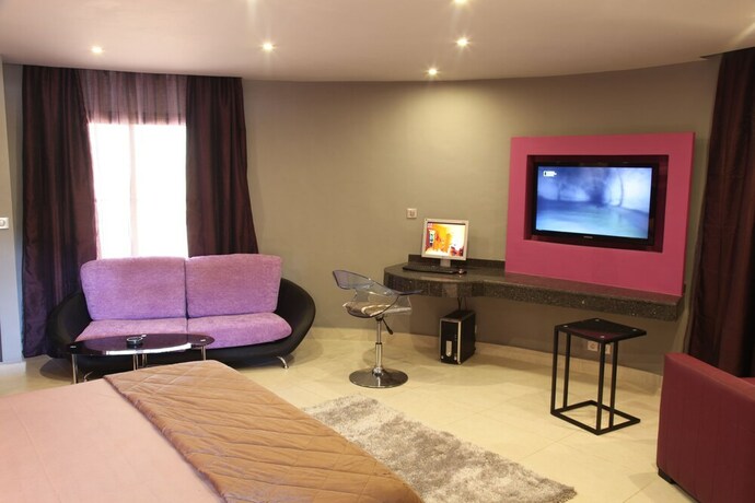 Imagen de la habitación del Hotel Le Wafou. Foto 14