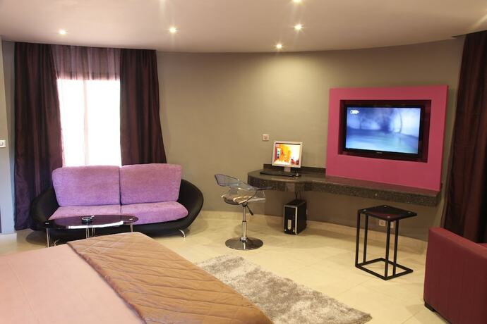 Imagen de la habitación del Hotel Le Wafou. Foto 17