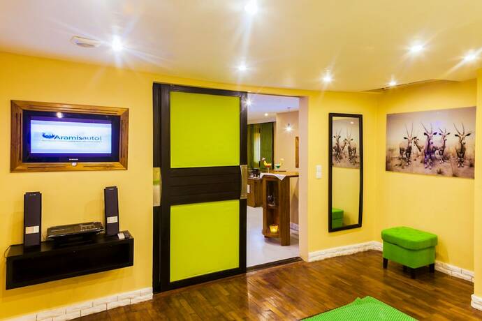 Imagen de la habitación del Hotel Le Wafou. Foto 18