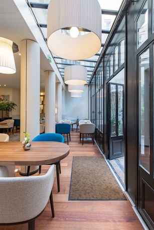 Imagen del bar/restaurante del Hotel Le Walt. Foto 4