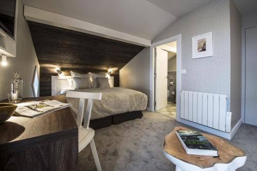 Imagen de la habitación del Hotel Le Whymper. Foto 7