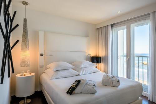 Imagen de la habitación del Hotel Le Windsor Grande Plage Biarritz. Foto 9