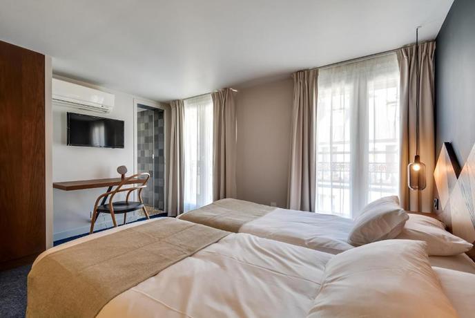 Imagen de la habitación del Hotel Le Wit. Foto 4