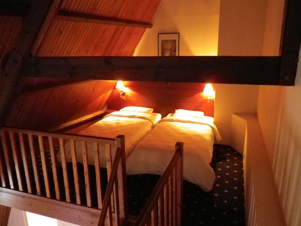 Imagen de la habitación del Hotel Le Yachtman, The Originals Collection. Foto 10