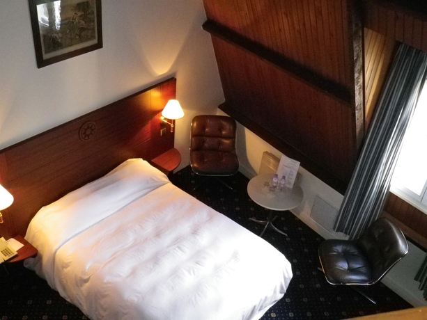 Imagen de la habitación del Hotel Le Yachtman, The Originals Collection. Foto 11