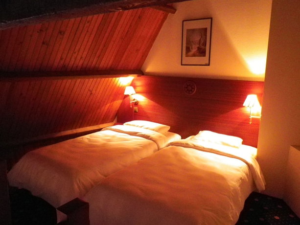 Imagen de la habitación del Hotel Le Yachtman, The Originals Collection. Foto 13