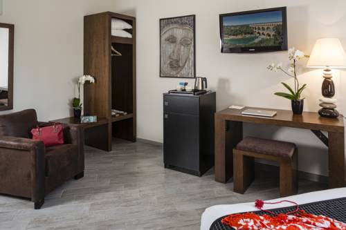 Imagen de la habitación del Hotel Le Ya'tis. Foto 8