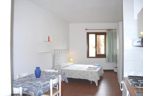 Imagen de la habitación del Hotel Le case di Stella Maris. Foto 7