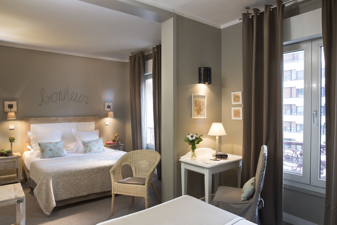 Imagen de la habitación del Hotel Léopold, París. Foto 7