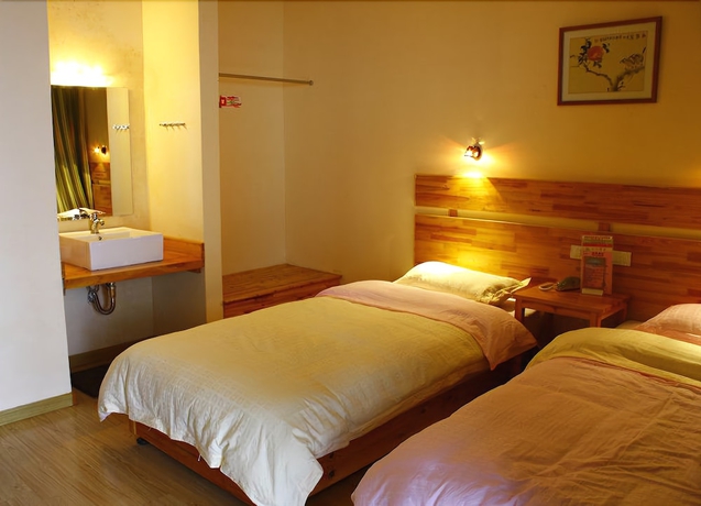 Imagen de la habitación del Hotel Leader Guest House-longji Branch. Foto 8