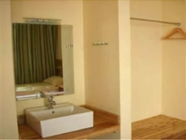 Imagen de la habitación del Hotel Leader Guest House-longji Branch. Foto 12