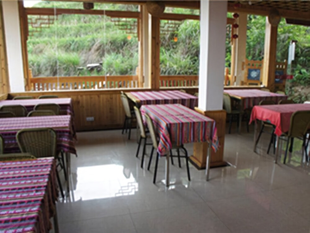 Imagen del bar/restaurante del Hotel Leader Guest House-longji Branch. Foto 4