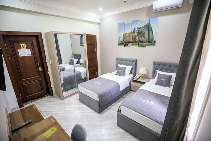 Imagen de la habitación del Hotel Leader, Taskent. Foto 13