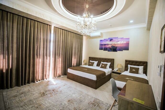 Imagen de la habitación del Hotel Leader, Taskent. Foto 15