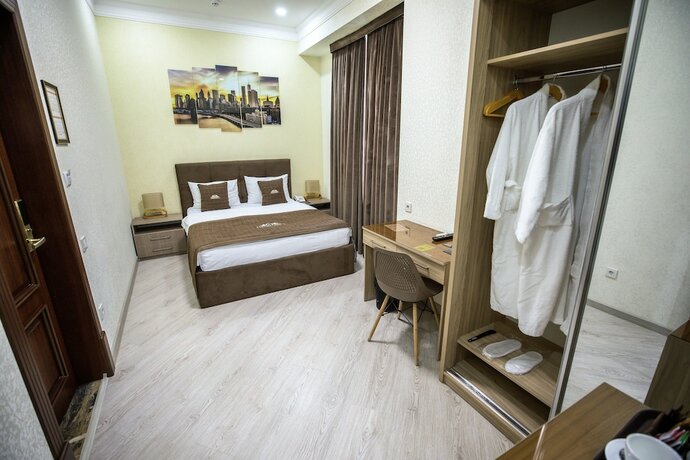 Imagen de la habitación del Hotel Leader, Taskent. Foto 16