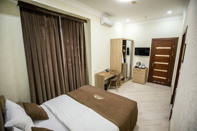 Imagen de la habitación del Hotel Leader, Taskent. Foto 18