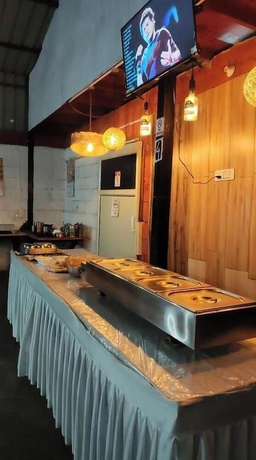 Imagen del bar/restaurante del Hotel LeafWalk Resort. Foto 7