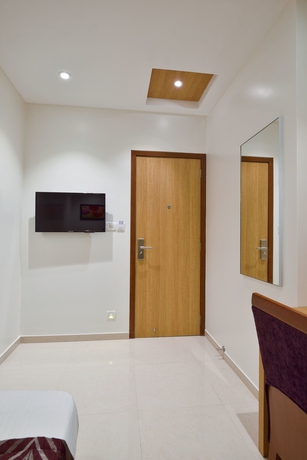 Imagen de la habitación del Hotel Leafio Mumbai. Foto 6