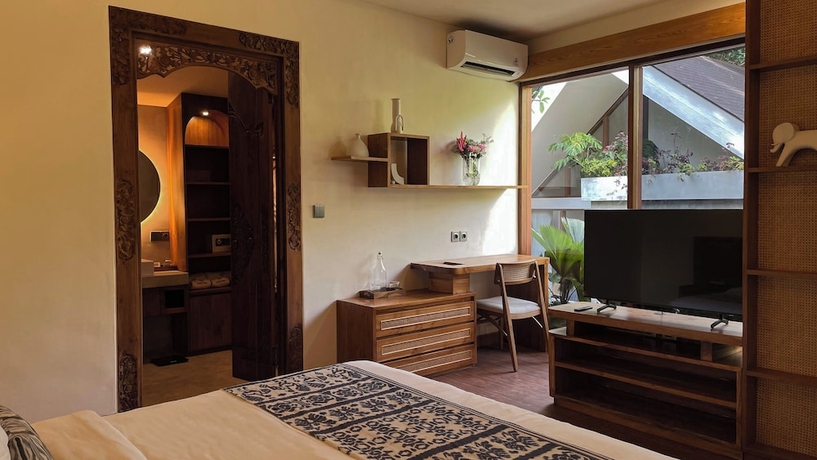 Imagen de la habitación del Hotel Leafy Home Canggu. Foto 6