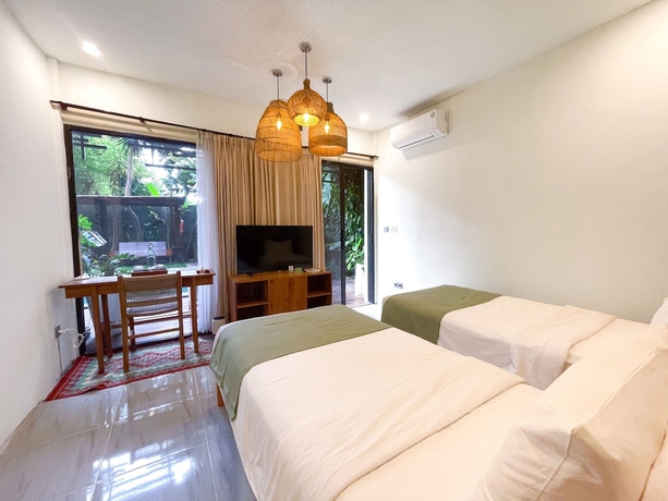 Imagen de la habitación del Hotel Leafy Home Canggu. Foto 10