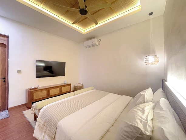 Imagen de la habitación del Hotel Leafy Home Canggu. Foto 13