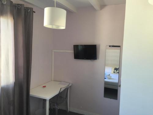 Imagen de la habitación del Hotel L'eau Des Collines. Foto 9