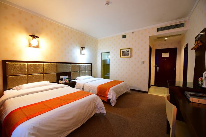 Imagen de la habitación del Hotel Lecheng Hotel. Foto 11