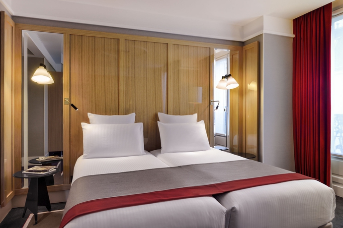 Imagen de la habitación del Hotel L'echiquier Opéra Paris Mgallery Collection. Foto 10