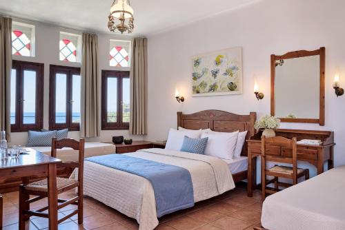 Imagen de la habitación del Hotel Leda Village Resort. Foto 16