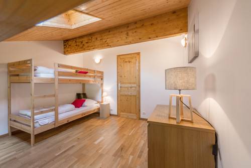 Imagen de la habitación del Hotel L'eden Skis Aux Pieds. Foto 3