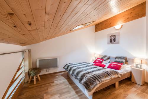 Imagen de la habitación del Hotel L'eden Skis Aux Pieds. Foto 4