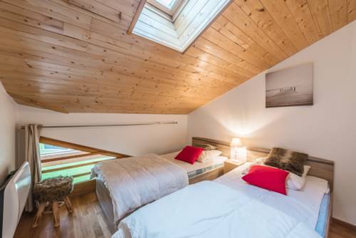 Imagen de la habitación del Hotel L'eden Skis Aux Pieds. Foto 5