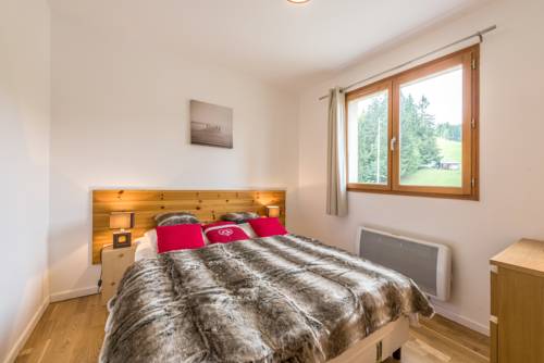 Imagen de la habitación del Hotel L'eden Skis Aux Pieds. Foto 11