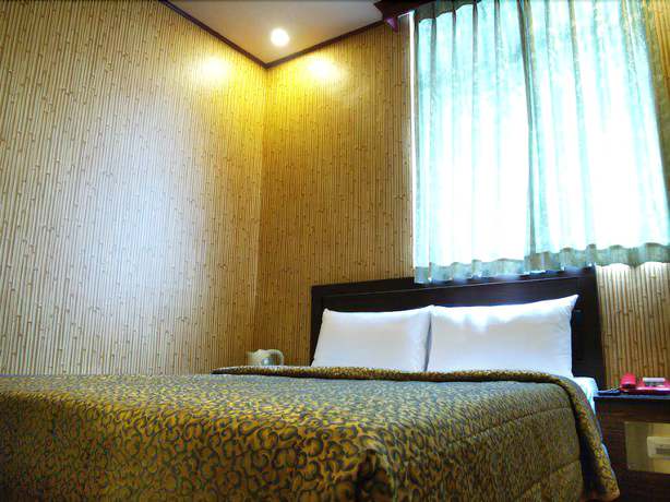 Imagen de la habitación del Hotel Lee - Chan. Foto 2