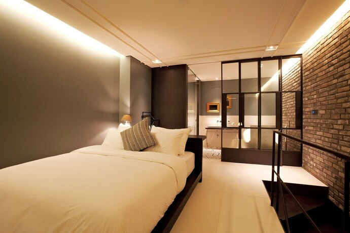 Imagen de la habitación del Hotel Lee Design. Foto 20