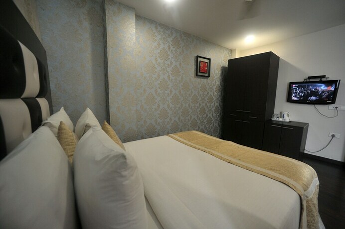 Imagen de la habitación del Hotel Lee International. Foto 22