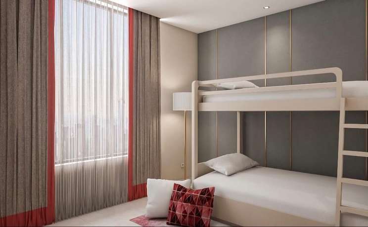 Imagen de la habitación del Hotel Leedon And Suites Surabaya. Foto 7
