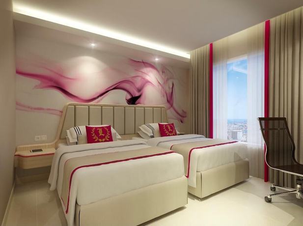 Imagen de la habitación del Hotel Leedon And Suites Surabaya. Foto 8