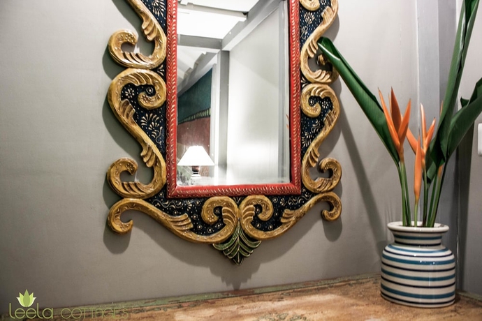 Imagen de la habitación del Hotel Leela Cottages. Foto 2