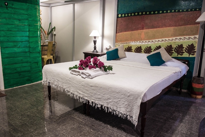 Imagen de la habitación del Hotel Leela Cottages. Foto 3