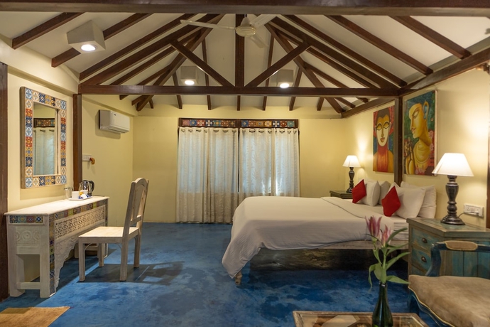 Imagen de la habitación del Hotel Leela Cottages. Foto 6