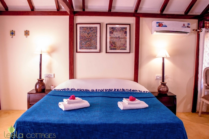 Imagen de la habitación del Hotel Leela Cottages. Foto 8