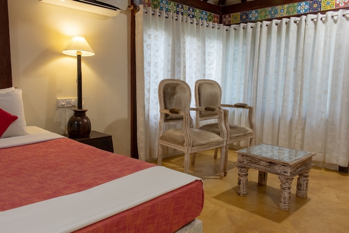 Imagen de la habitación del Hotel Leela Cottages. Foto 12